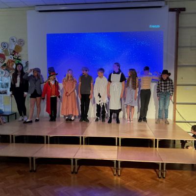 Children rehearsing for their play